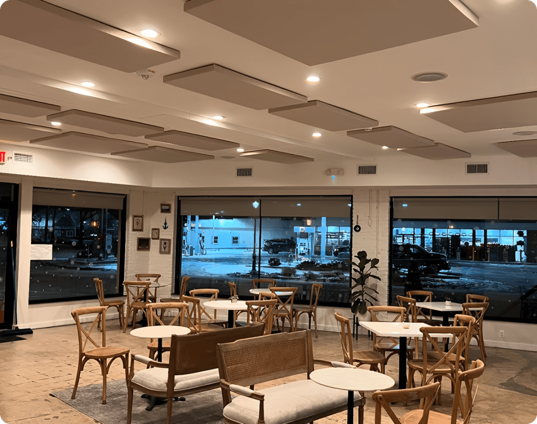 Empty cafe with large windows and tables