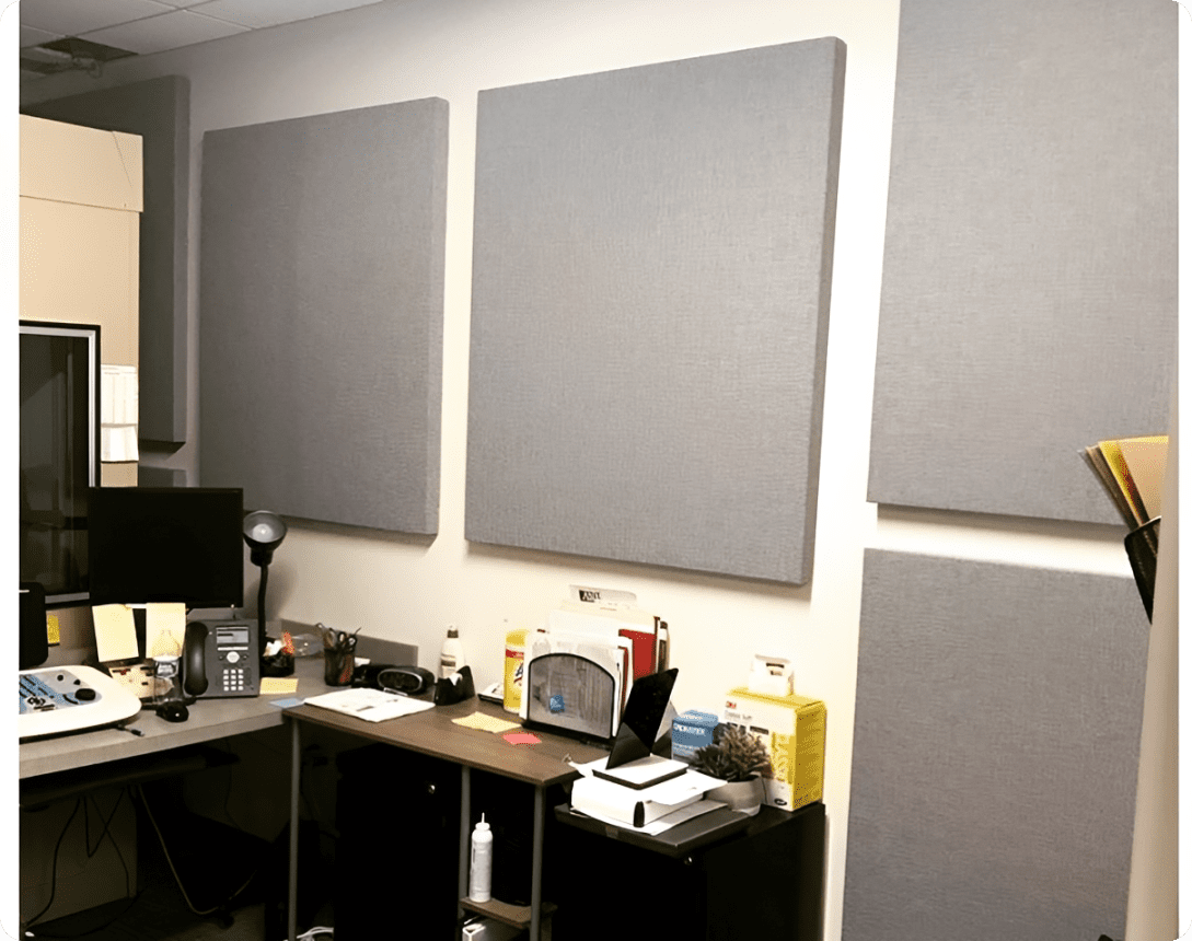 Office corner with gray acoustic panels