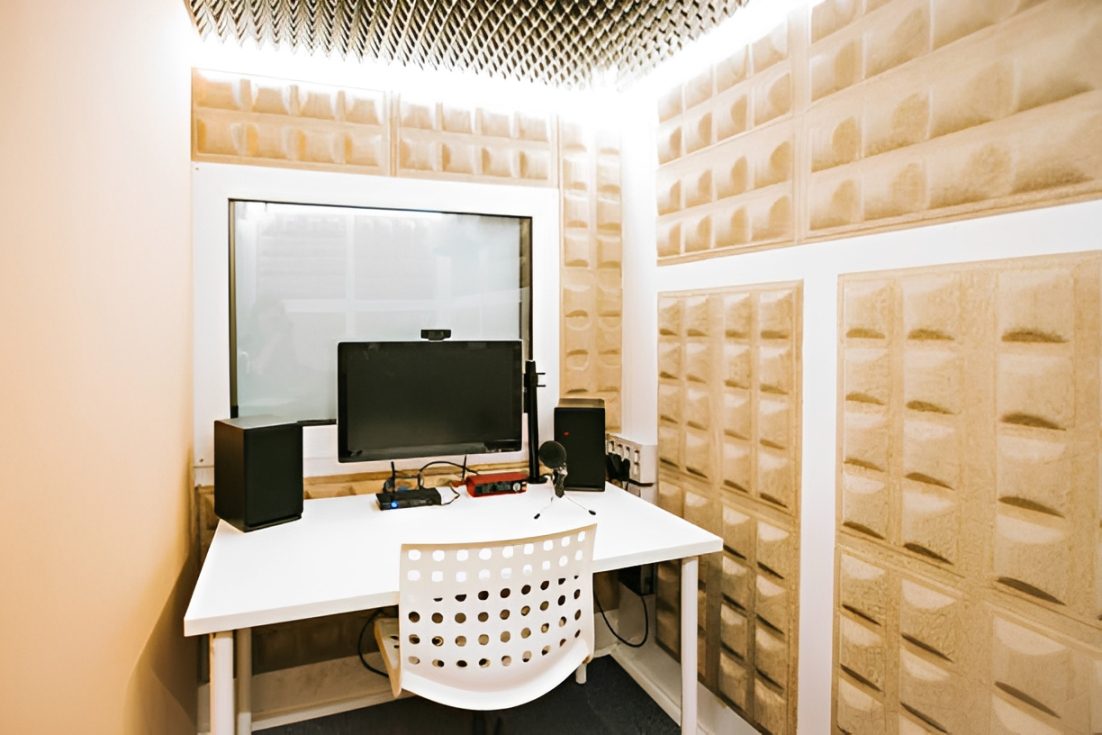 Soundproof recording studio with computer setup
