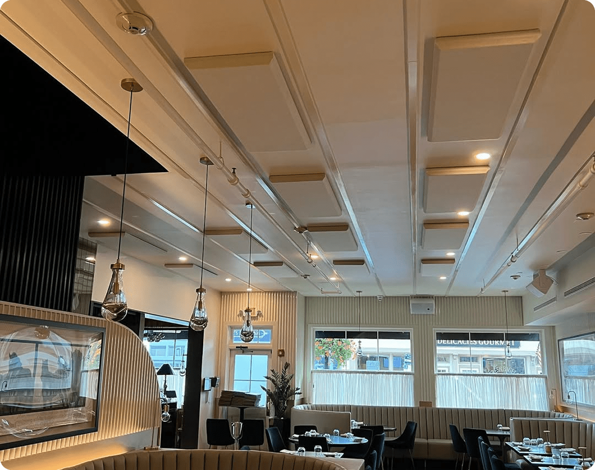 Upscale dining interior with decorative ceiling panels